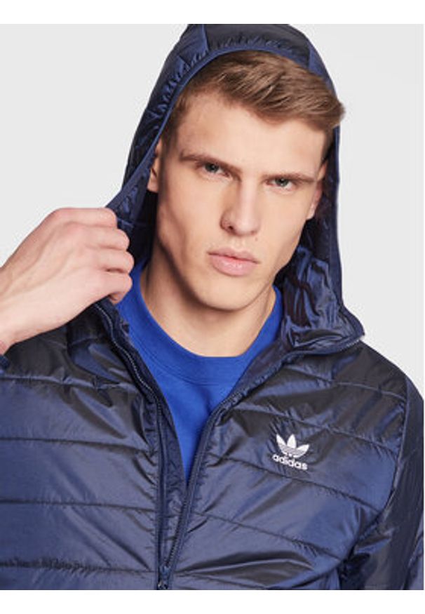 Adidas - adidas Kurtka przejściowa Padded Hooded Puffer Jacket HL9210 Niebieski Regular Fit. Kolor: niebieski. Materiał: syntetyk