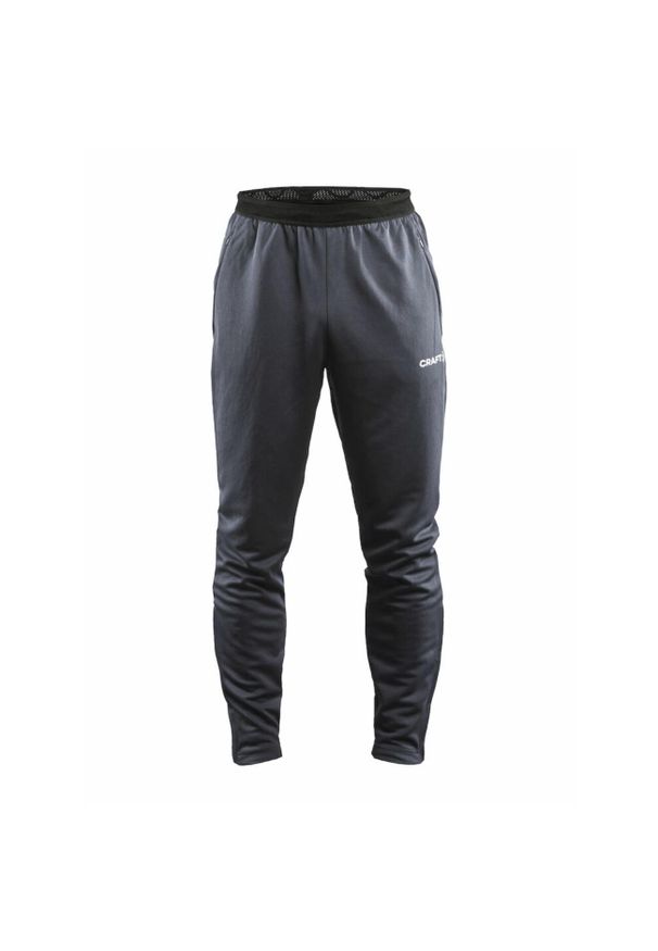 Spodnie treningowe męskie Craft Evolve. Kolor: szary. Materiał: syntetyk, materiał. Sport: fitness