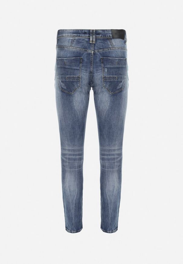 Born2be - Niebieskie Jeansy Skinny z Przetarciami i Dziurami Leonia. Kolor: niebieski