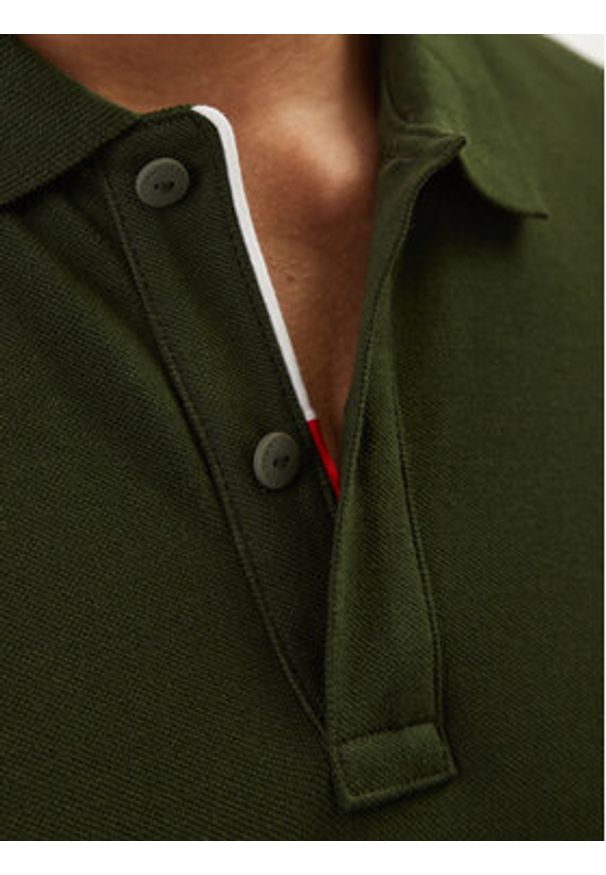 Tommy Jeans Polo DM0DM20676 Zielony Slim Fit. Typ kołnierza: polo. Kolor: zielony. Materiał: bawełna