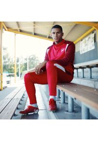 ARSENAL - Dres piłkarski dla dorosłych Arsenal 23/24. Kolor: czerwony. Materiał: dresówka. Sport: piłka nożna