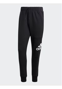 Adidas - adidas Spodnie dresowe Essentials French Terry Tapered Cuff Logo Joggers HA4342 Czarny Regular Fit. Kolor: czarny. Materiał: bawełna #6