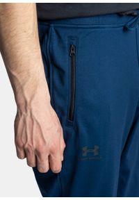 Spodnie dresowe męskie granatowe Under Armour Sportstyle Tricot. Kolor: niebieski. Materiał: dresówka. Sport: fitness