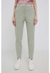 Vero Moda spodnie damskie kolor zielony proste medium waist. Okazja: na co dzień. Kolor: zielony. Materiał: dzianina. Styl: casual