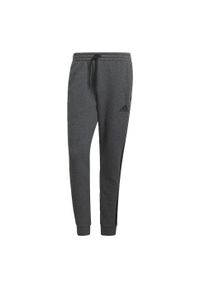 Adidas - Spodnie męskie adidas Essentials Tapered Cuff 3 Stripes. Kolor: czarny, szary, wielokolorowy. Materiał: wiskoza, polar, poliester, bawełna. Sport: joga i pilates, fitness