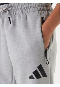 Adidas - adidas Spodnie dresowe Z.N.E. JD9586 Szary Regular Fit. Kolor: szary. Materiał: syntetyk #4