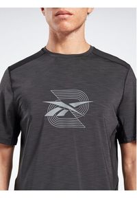 Reebok T-Shirt Activchill Graphic Move HS5933 Czarny Active Fit. Kolor: czarny. Materiał: syntetyk