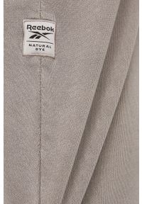 Reebok Classic Spodnie bawełniane męskie kolor beżowy gładkie. Kolor: beżowy. Materiał: bawełna. Wzór: gładki