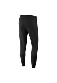 Nike - Spodnie Do Joggingu Męskie Polar Sportswear Club. Kolor: czarny. Materiał: polar. Sport: bieganie