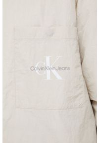 Calvin Klein Jeans kurtka dwustronna damska kolor beżowy przejściowa. Okazja: na co dzień. Kolor: beżowy. Materiał: włókno. Styl: casual