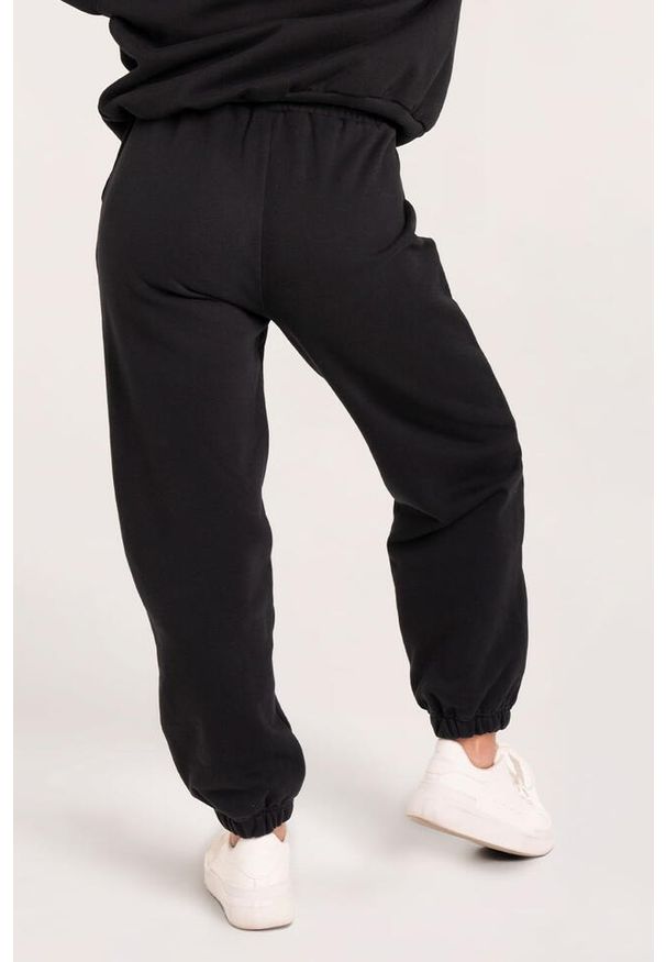 GYM GLAMOUR - Spodnie fitness damskie Gym Glamour dresowe. Kolor: czarny. Materiał: dresówka. Sport: fitness