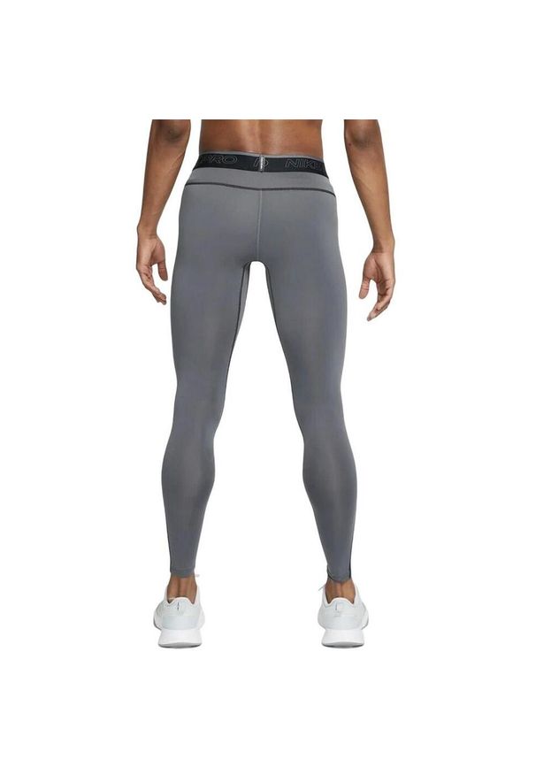 Nike - Męskie Rajstopy DriFIT. Kolor: szary. Długość: długie