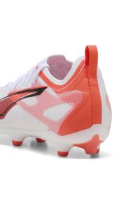 Puma - Młodzieżowe buty piłkarskie ULTRA 5 PRO FG/AG PUMA White Black Glowing Red. Kolor: biały, czarny, czerwony, wielokolorowy. Sport: piłka nożna