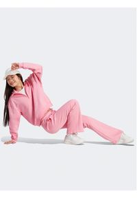 Adidas - adidas Spodnie dresowe ALL SZN Fleece Graphics Joggers IC8718 Różowy Regular Fit. Kolor: różowy. Materiał: bawełna #3