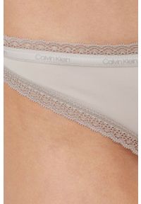Calvin Klein Underwear stringi (3-pack) kolor beżowy. Kolor: beżowy. Materiał: materiał. Wzór: gładki #5