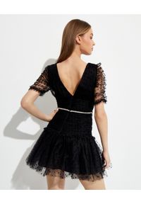 SELF PORTRAIT - Czarna sukienka mini w kropki. Kolor: czarny. Materiał: tkanina. Wzór: kropki. Typ sukienki: dopasowane. Długość: mini
