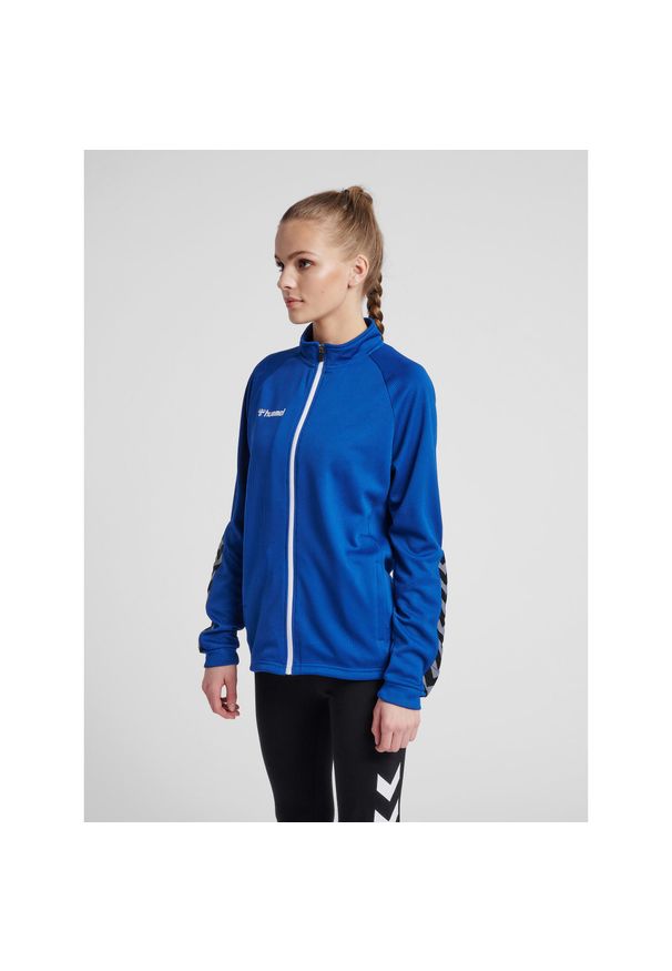 Kurtka damska Hummel Zip hmlAUTHENTIC Poly. Kolor: niebieski. Materiał: poliester. Sport: fitness, piłka ręczna