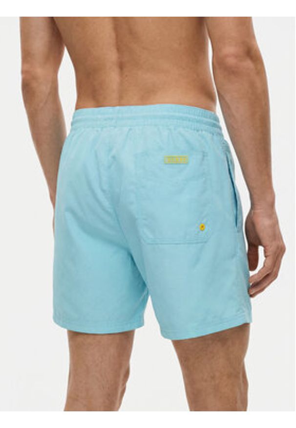 Guess Szorty kąpielowe F6GT25 WG282 SHORT Niebieski jasny Regular Fit. Kolor: niebieski. Materiał: syntetyk