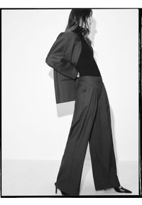 Reserved - Szerokie spodnie z wełną - zielony. Kolor: zielony. Materiał: wełna #1