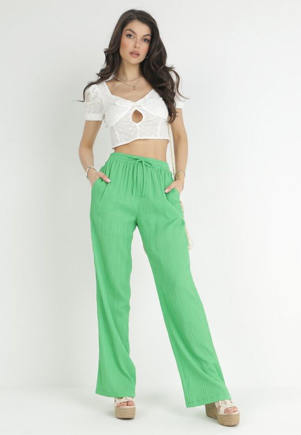 Born2be - Ciemnozielone Szerokie Spodnie High Waist Melsa. Stan: podwyższony. Kolor: zielony. Materiał: tkanina. Długość: długie