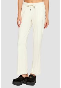 Juicy Couture - JUICY COUTURE Kremowe spodnie dresowe damskie z cyrkoniami Tina, Rozmiar S. Kolor: beżowy. Materiał: dresówka. Wzór: aplikacja #1