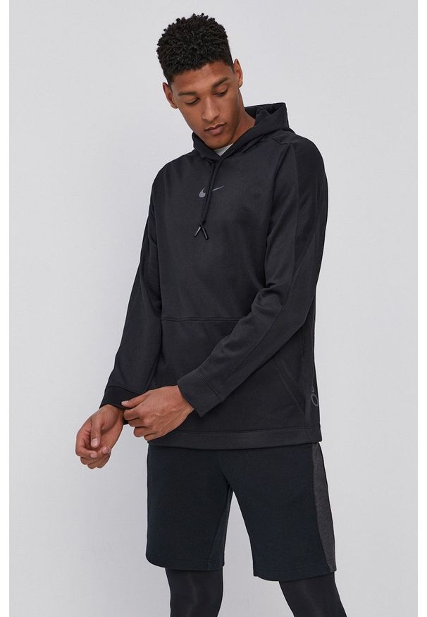 Nike Bluza męska kolor czarny z kapturem gładka. Typ kołnierza: kaptur. Kolor: czarny. Materiał: tkanina, skóra, włókno. Wzór: gładki