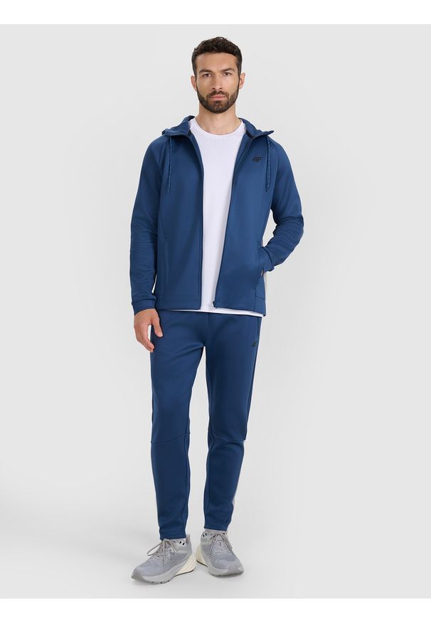 4f - 4F Bluza treningowa regular szybkoschnąca męska - niebieska XL. Okazja: na co dzień. Typ kołnierza: kaptur. Kolor: niebieski. Materiał: dzianina, elastan, włókno, syntetyk, materiał. Długość rękawa: raglanowy rękaw. Wzór: gładki, ze splotem. Styl: casual, sportowy