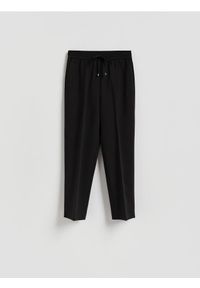 Reserved - Spodnie z kantem - czarny. Kolor: czarny. Materiał: tkanina, wiskoza #1