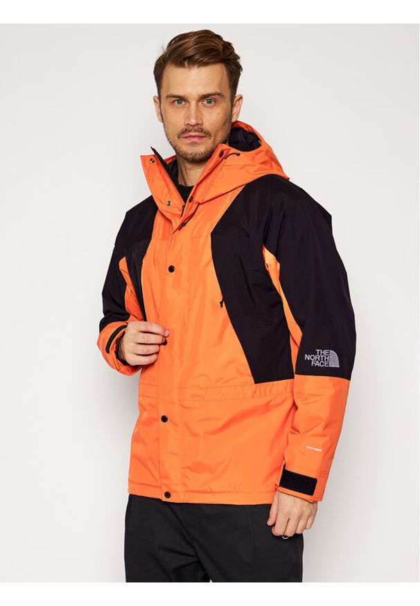 The North Face Kurtka outdoor Mountain Light NF0A3XY5 Pomarańczowy Regular Fit. Kolor: pomarańczowy. Materiał: syntetyk. Sport: outdoor
