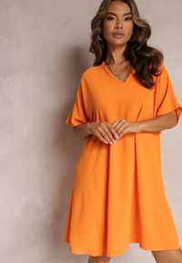 Renee - Pomarańczowa Sukienka o Kroju Nietoperza z Ozdobnym Wiązaniem na Plecach Cylean. Kolor: pomarańczowy #1
