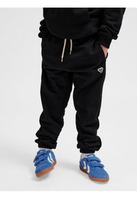 Spodnie dresowe dla dzieci Hummel Bee. Kolor: czarny. Materiał: dresówka. Sport: joga i pilates #2