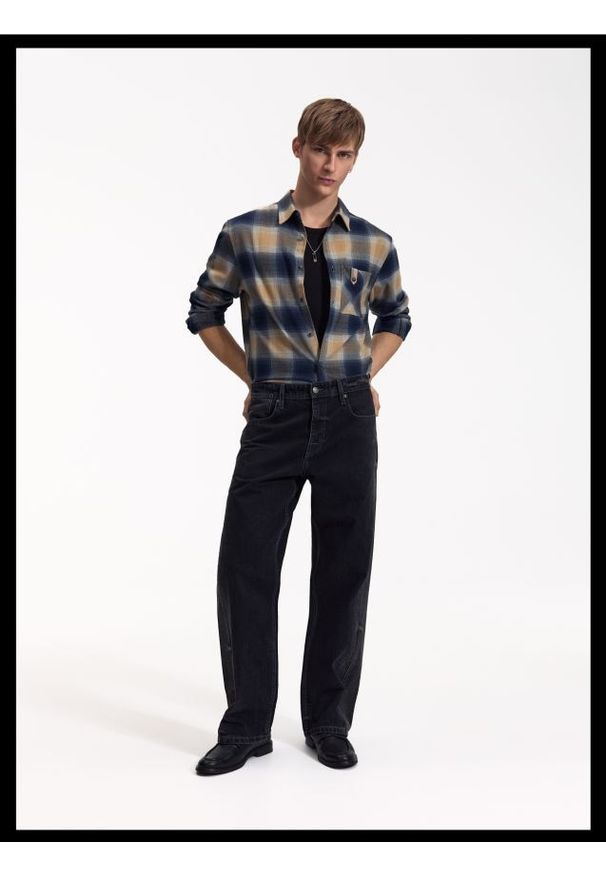 Reserved - Jeansy baggy z efektem sprania - szary. Kolor: szary