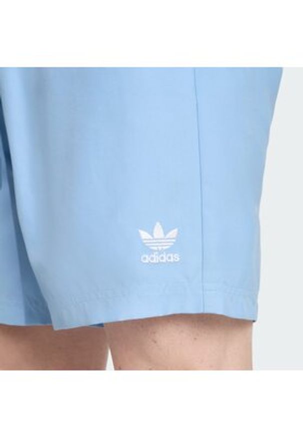 Adidas - adidas Szorty kąpielowe adicolor 3-Stripes JX5017 Błękitny Regular Fit. Kolor: niebieski. Materiał: syntetyk