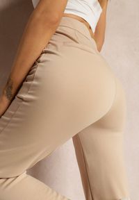 Renee - Beżowe Spodnie Szerokie Tanora. Kolor: beżowy. Materiał: tkanina. Długość: długie. Wzór: jednolity, aplikacja, gładki #5