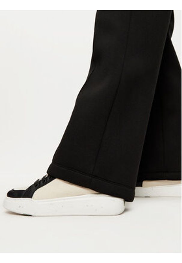 Calvin Klein Spodnie materiałowe K20K207947 Czarny Relaxed Fit. Kolor: czarny. Materiał: wiskoza