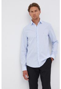 Calvin Klein - Koszula bawełniana. Typ kołnierza: kołnierzyk klasyczny. Kolor: niebieski. Materiał: bawełna. Długość rękawa: długi rękaw. Długość: długie. Styl: klasyczny #5