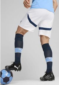 Puma - Szorty Manchester City 2024/25. Kolor: biały, wielokolorowy, niebieski. Sport: piłka nożna