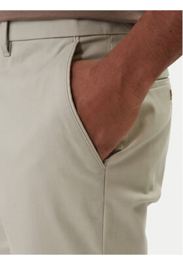 Calvin Klein Chinosy LV04LD613G Beżowy Slim Fit. Kolor: beżowy. Materiał: bawełna