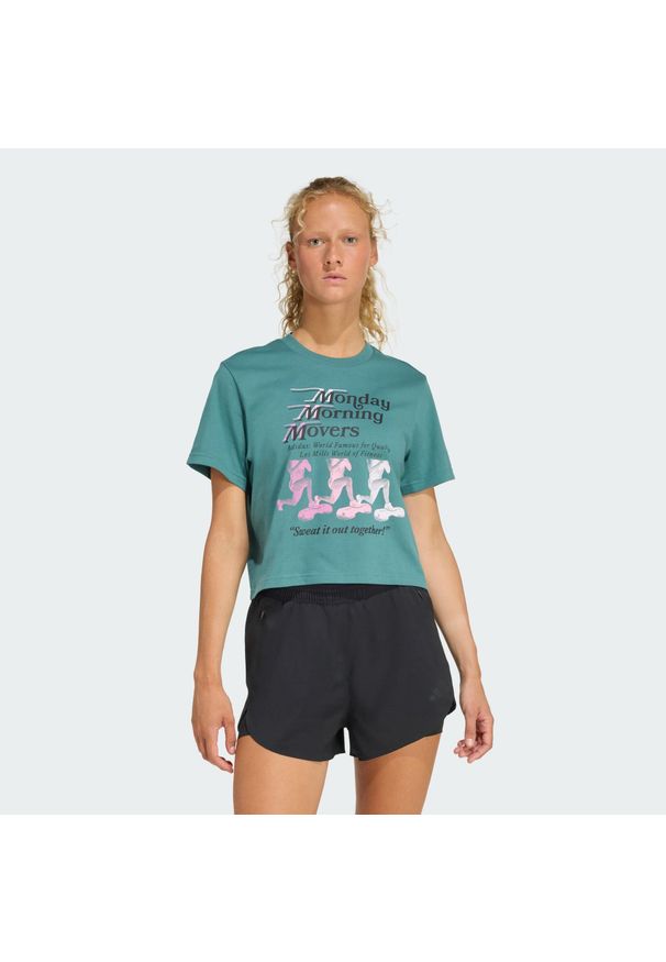 Adidas - Koszulka Lesmills Movers Graphic. Kolor: niebieski. Materiał: dzianina. Wzór: nadruk. Sport: fitness