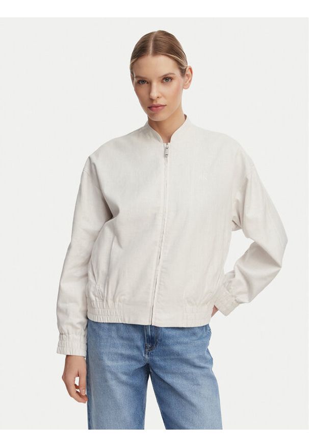 Calvin Klein Jeans Kurtka bomber LV047F510G Beżowy jasny Regular Fit. Kolor: beżowy. Materiał: bawełna