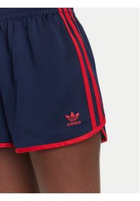 Adidas - adidas Szorty sportowe adicolor 3-Stripes Sprinter JZ3514 Granatowy Loose Fit. Kolor: niebieski. Materiał: syntetyk #4