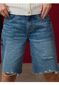 Sinsay - Szorty jeansowe z przetarciami - niebieski. Kolor: niebieski. Materiał: jeans #1