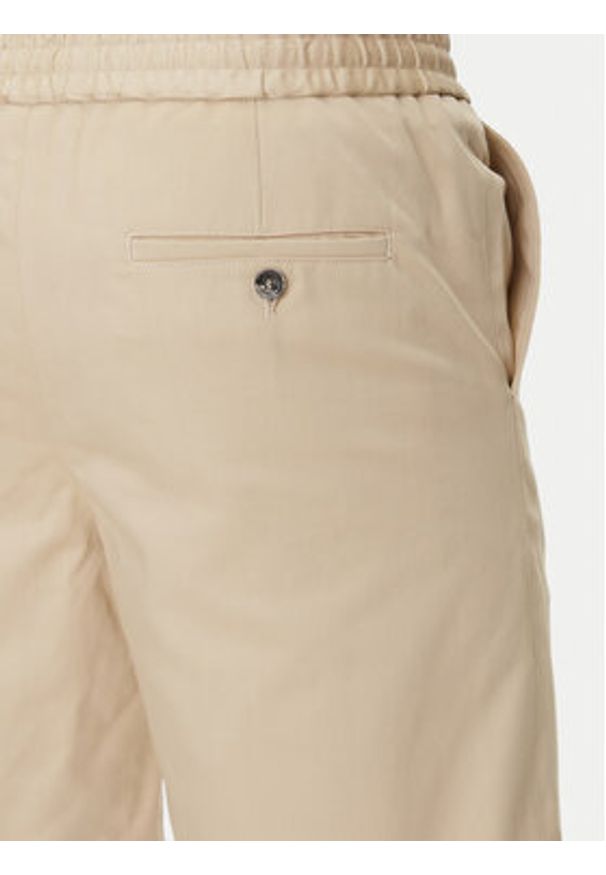 AMI PARIS - AMI Paris Szorty materiałowe HSO303.CO0103 Beżowy Regular Fit. Kolor: beżowy. Materiał: bawełna