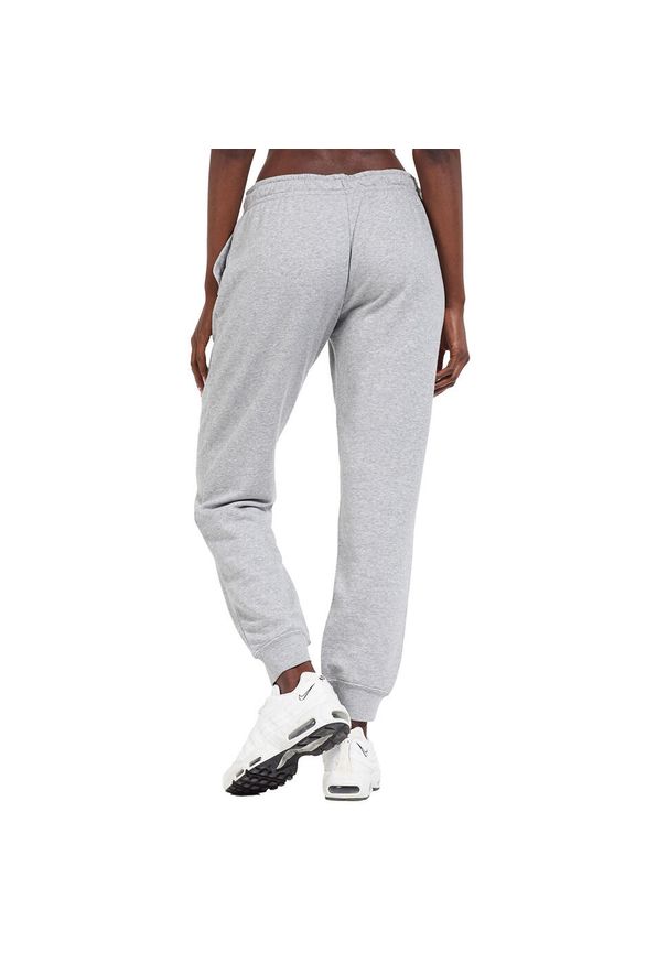 Nike - Spodnie Do Joggingu Damskie Polar Essential. Kolor: szary. Materiał: polar. Sport: bieganie