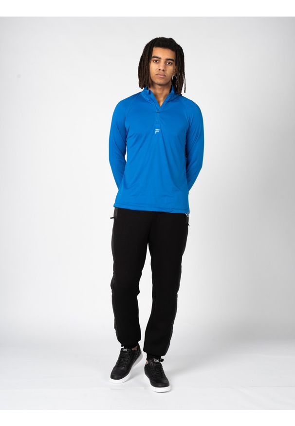 Fila Longsleeve "Training Roye" | FAM0284 | Mężczyzna | Niebieski. Typ kołnierza: kołnierzyk stójkowy. Kolor: niebieski. Materiał: poliester. Długość rękawa: długi rękaw. Wzór: nadruk