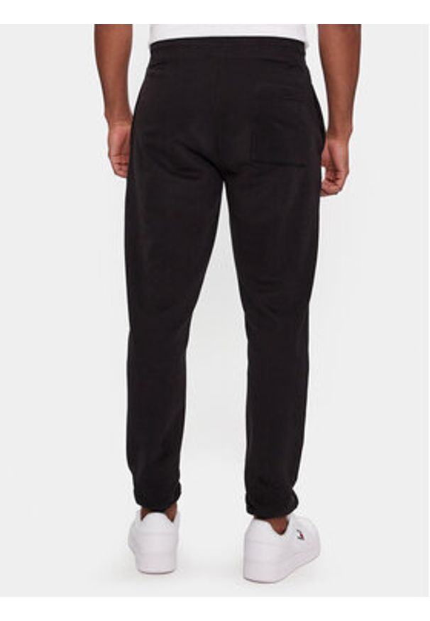 Tommy Jeans Spodnie dresowe Entry DM0DM18935 Czarny Slim Fit. Kolor: czarny. Materiał: bawełna