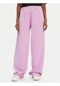 Hugo - HUGO Spodnie dresowe Nolasa_B 50545019 Różowy Loose Fit. Kolor: różowy. Materiał: bawełna