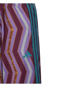 Adidas - adidas Spodnie dresowe FARM Tiro JL8616 Fioletowy Loose Fit. Kolor: fioletowy. Materiał: bawełna