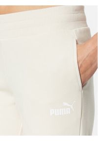 Puma Spodnie dresowe Ess 586841 Biały Regular Fit. Kolor: biały. Materiał: dresówka, bawełna, syntetyk