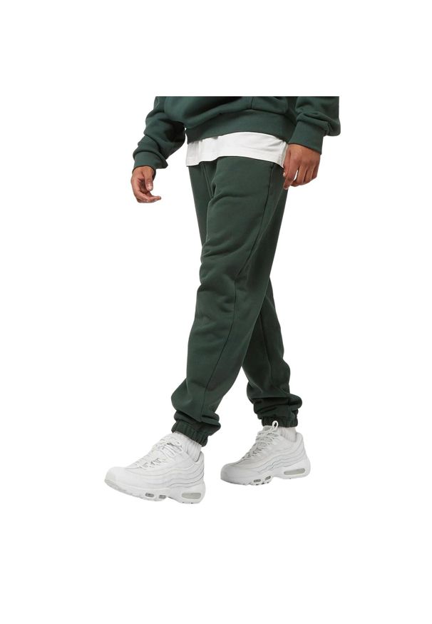 Spodnie dresowe Urban Classics Ultra Heavy. Kolor: zielony. Materiał: dresówka. Sport: bieganie